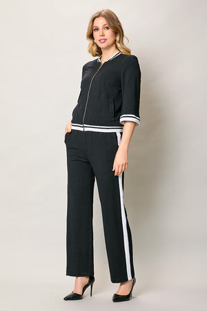 Conjunto de blusa con cierre y pantalón color negro