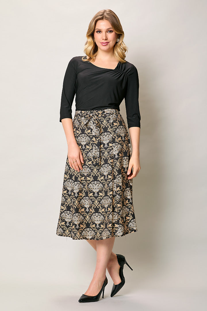 Vestido elegante color negro manga 3/4 falda estampada