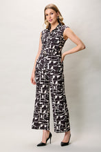 Cargar imagen en el visor de la galería, Conjunto negro estampado geométrico sin manga