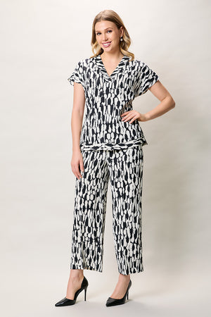 Conjunto estampado de blusa cuello v con pantalón