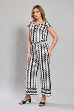 Cargar imagen en el visor de la galería, Jumpsuit estampado blanco con negro y cinturón