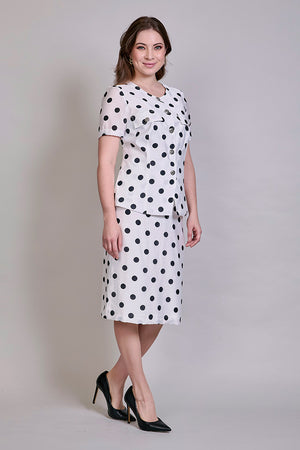 Conjunto elegante de saco con falda estampado a lunares