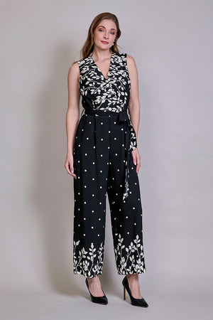 Jumpsuit negro sin manga estampado floral con lunares