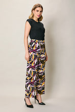Cargar imagen en el visor de la galería, Pantalón bota amplia con estampado multicolor