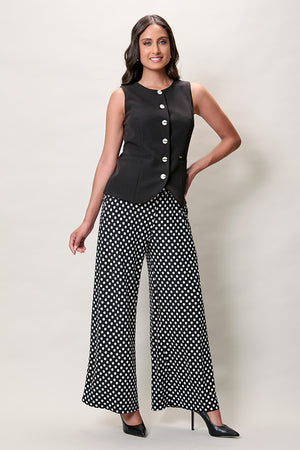 Pantalón casual bota amplia con estampado a lunares