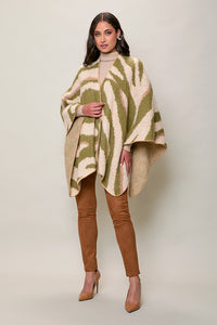 Capa color beige con estampado simétrico verde
