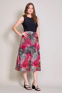 Vestido negro elegante con falda estampada y bolsillos