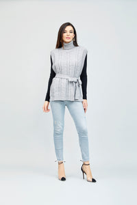 Suéter tejido sin mangas y cuello alto color gris
