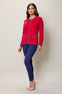 Suéter elegante color rojo con cierre y bolsillos