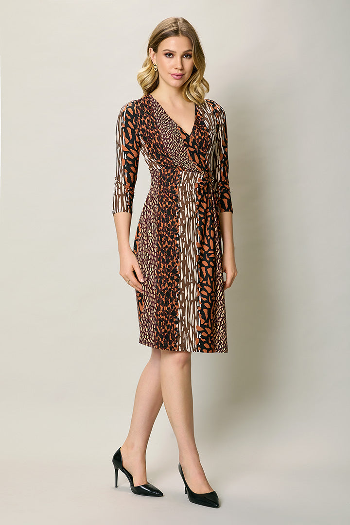 Vestido casual drapeado color naranja con estampado